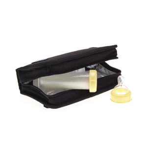 FlexiFreeze refreezable breastmilk pocketbook cooler, black,  laying open on its side with a container of milk inside