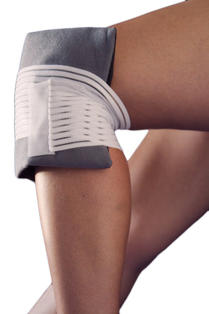 Man wearing FlexiFreeze single cold therapy wrap on knee