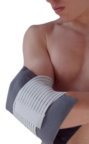 Man wearing FlexiFreeze single cold therapy wrap on elbow