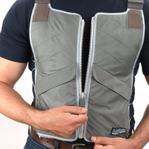 Man wearing FlexiFreeze professional zipper ice vest, charcoal, adjusting zipper 