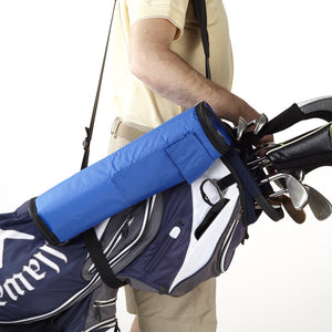 Man with FlexiFreeze refreezable golf bag, blue, slung over shoulder with his standard golf bag