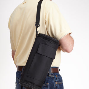 Man carrying with shoulder strap, FlexiFreeze wine bottle cooler refreezable, closed top 