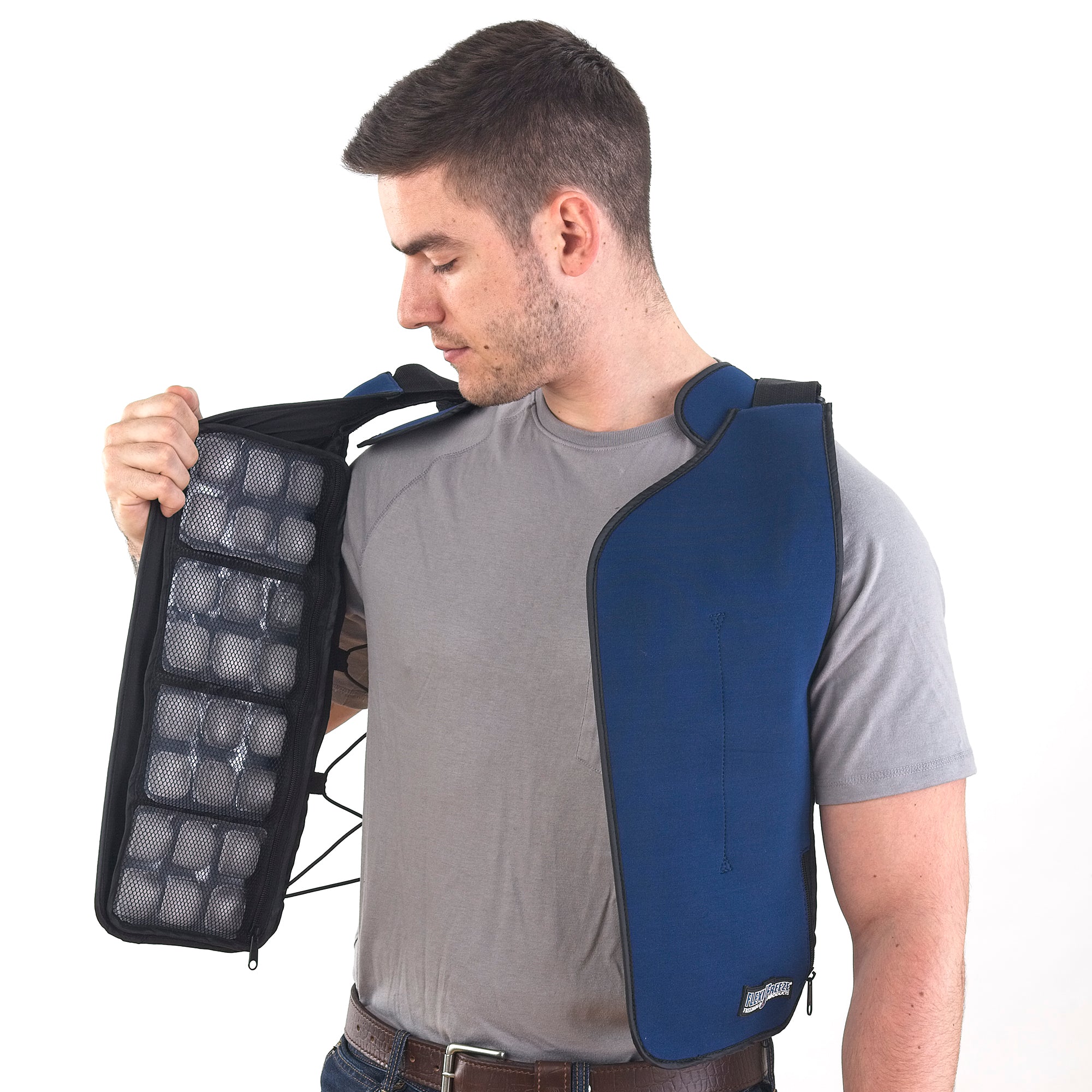 Man wearing FlexiFreeze personal velcro ice vest, blue, open, front view, ice panels visible